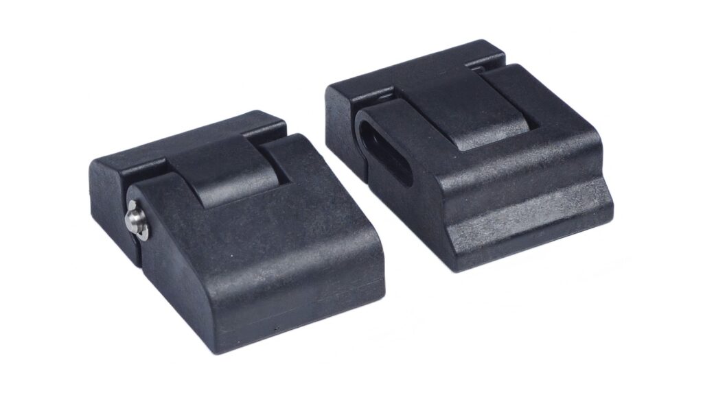 Ex pxb vs Ex pyb vs Ex pzc: Pressurization Markings Two black hinged enclosure accessories photographed on a white background