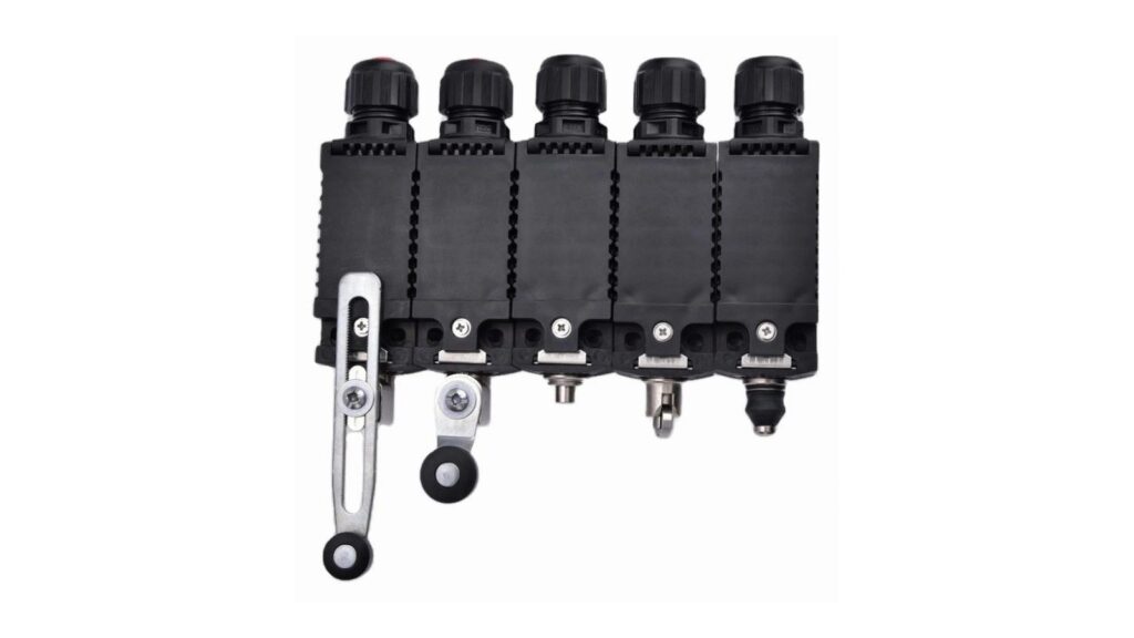 Explosion-Proof Limit Switches: 12 Buyer FAQs Five industrial limit-switch actuator arrangements photographed on a white background