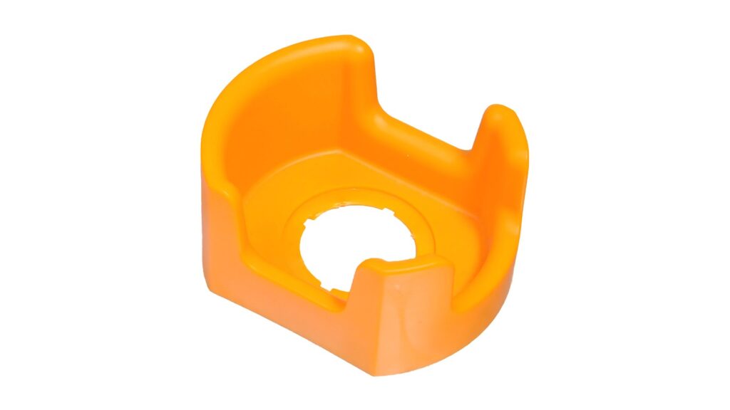 IECEx Certified Service Facility: What Buyers Verify Orange moulded protective shroud for a panel-mounted control device on a white background