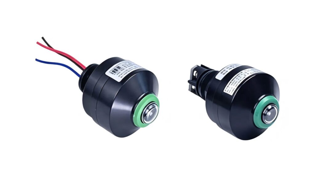 Intrinsic Safety Entity Parameters: A Matching Guide Two black panel-mount photoelectric sensor assemblies with green optical windows and lead wires on a white background