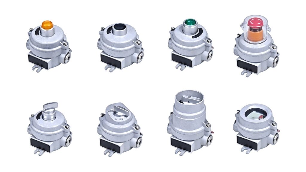 MMAIATEX ATEX Technical Guides: Ex ob/oc and Trace Heating Eight cast-metal panel control devices with buttons, guards, lenses and selector forms on a white background