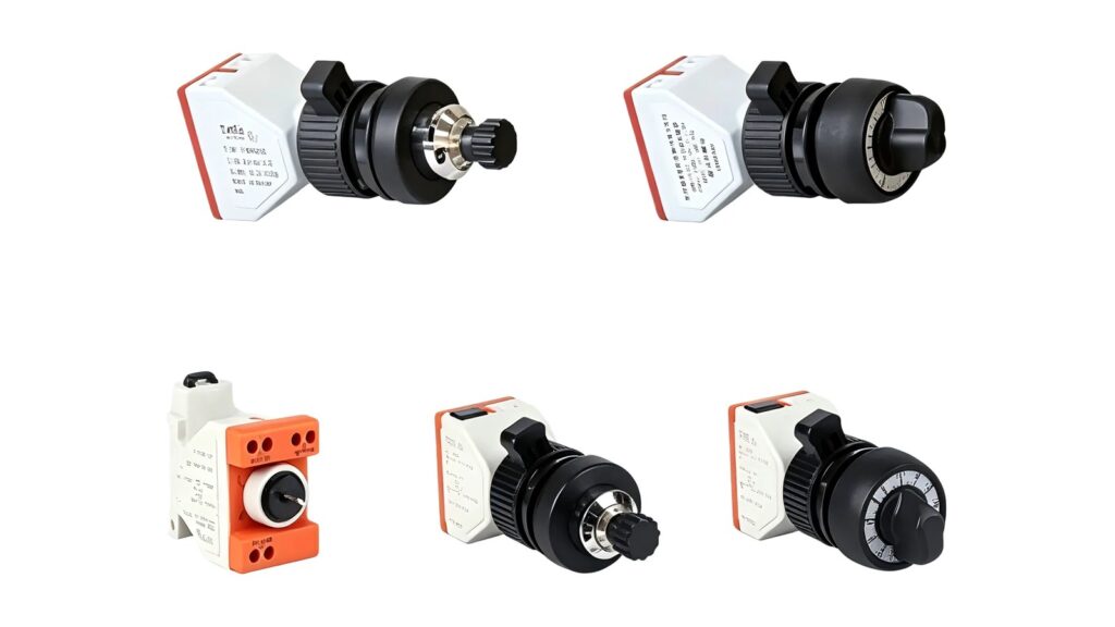Four rotary panel-mount industrial control devices photographed on a white background